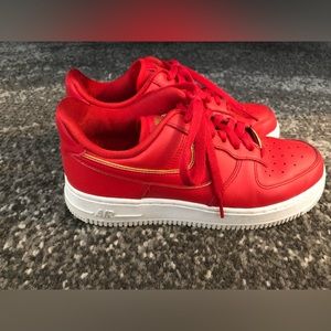 Nike red and gold women’s Air Force 1s